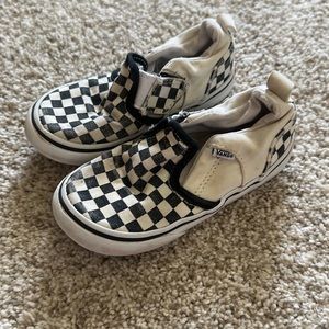 Checkered Vans slip ons
